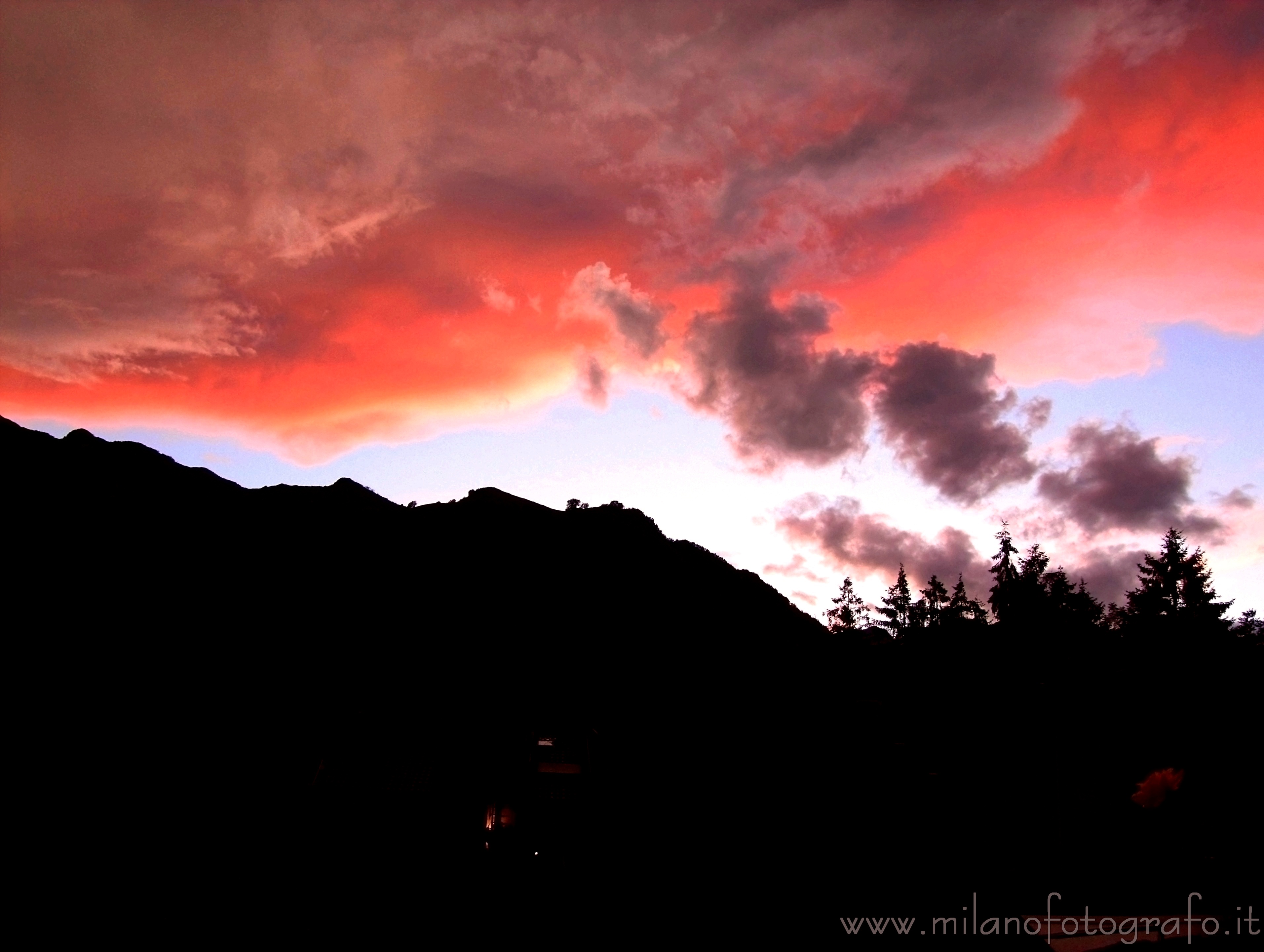 Valmosca fraction of Campiglia Cervo (Biella, Italy) - Sunset behind the Mologna mountain